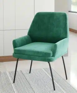 כורסא ירוקה מרופדת בבד קטיפה
